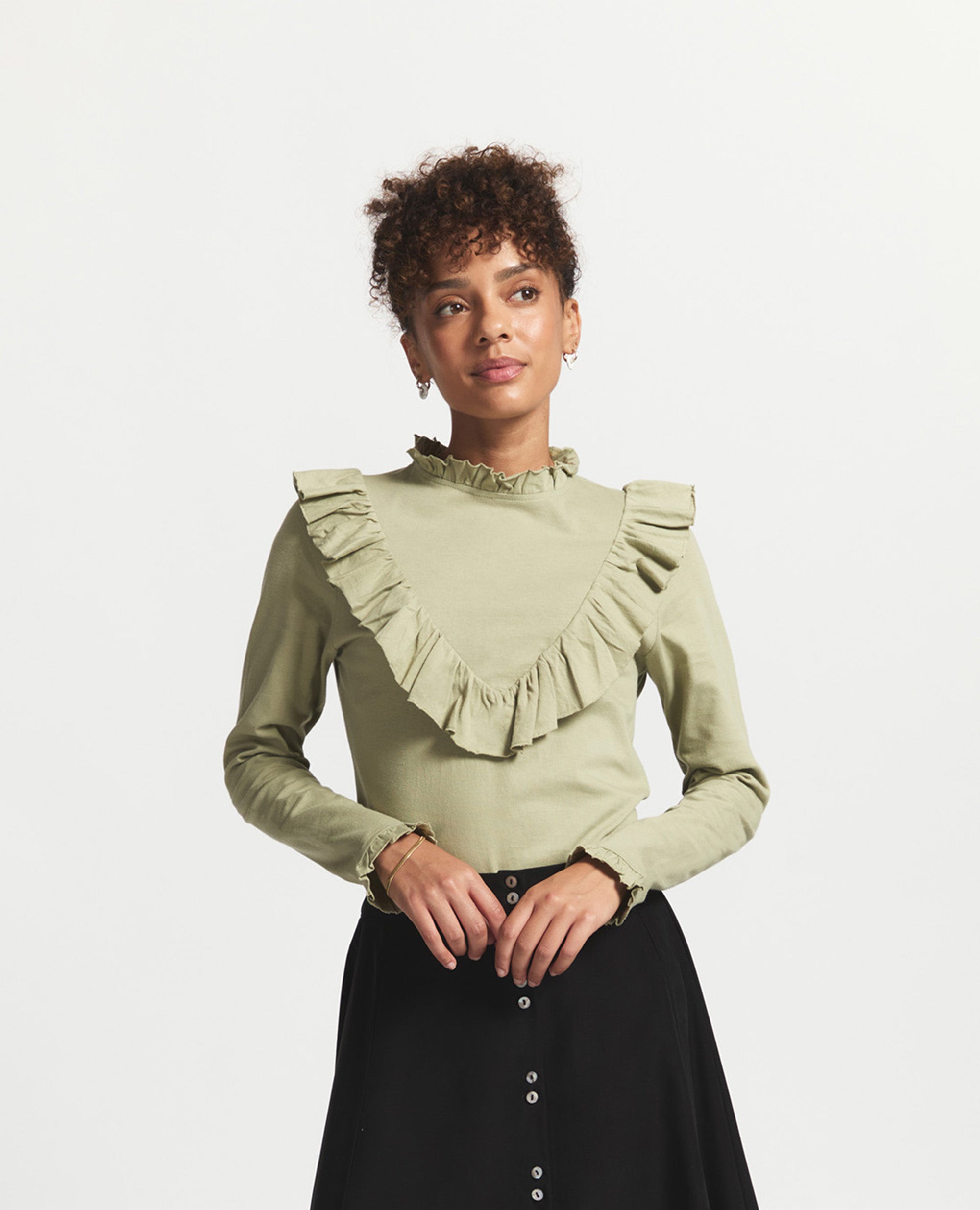 Tasia | Fitted top with frill on cuff | Ivy